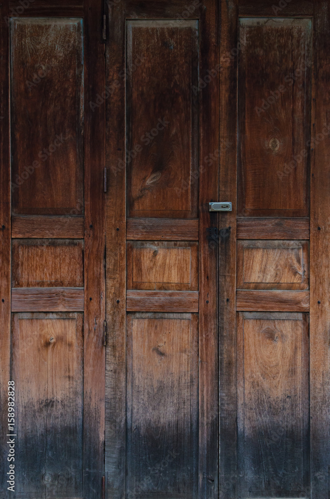 The antique old wooden door vintage style