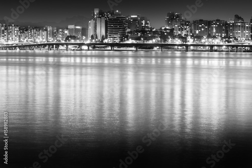 black and white picture of the skyline of downtown Seoul, Korea at night