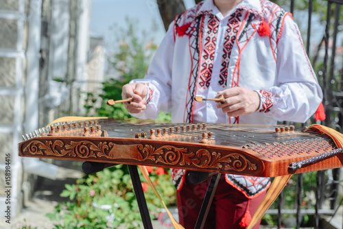 Wedding musician playing the dulcimer photo