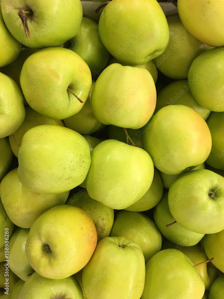 Top view of green yellow apples in pile Top view of green yellow apples in pile