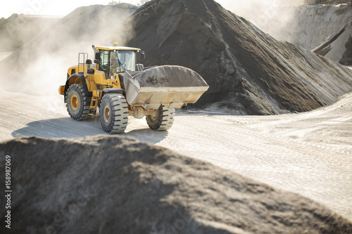 Digger working at quarry