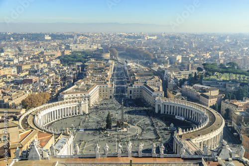 sight of the square of the basilica of san pedro and of the city of Rome, Italy.