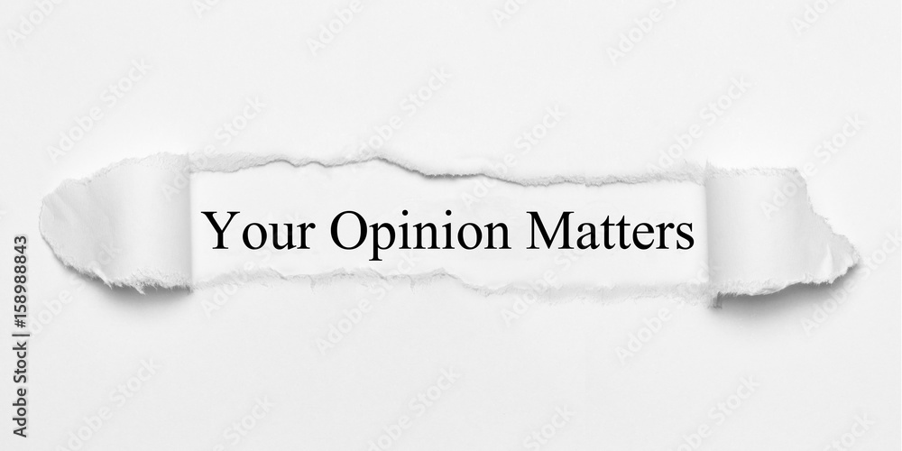 Obraz premium Your Opinion Matters on white torn paper