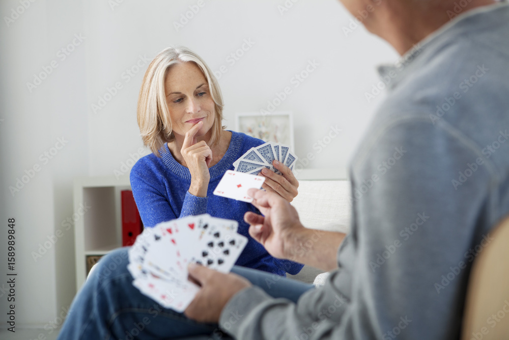 Couple playing cards Couple playing cards