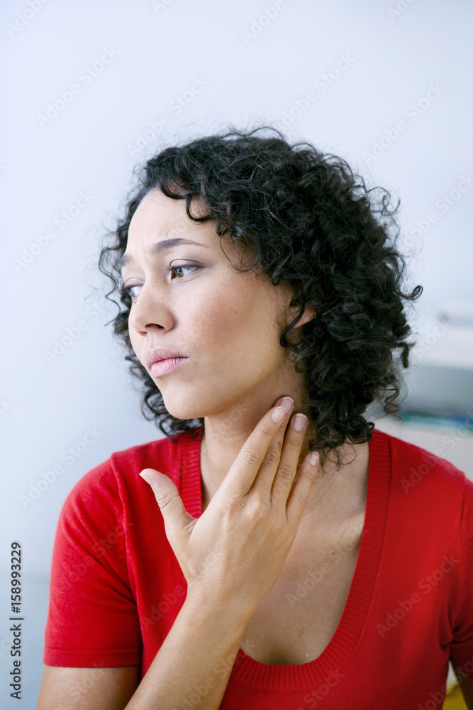 Woman with sore throat Woman with sore throat