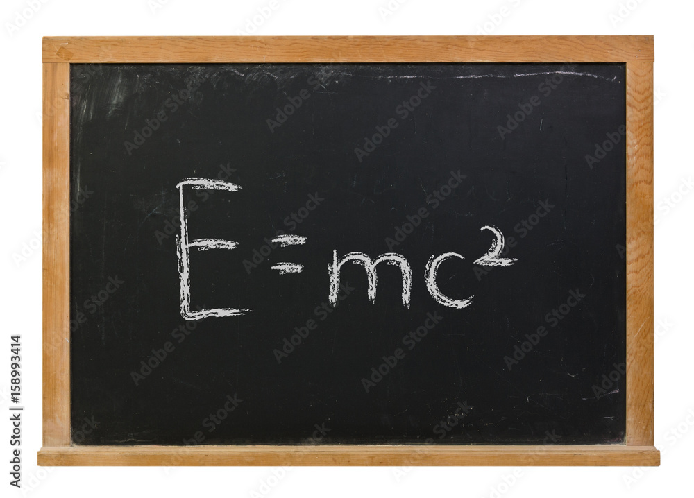 Fototapeta premium E=mc squared written in white chalk on a black chalkboard isolated on white
