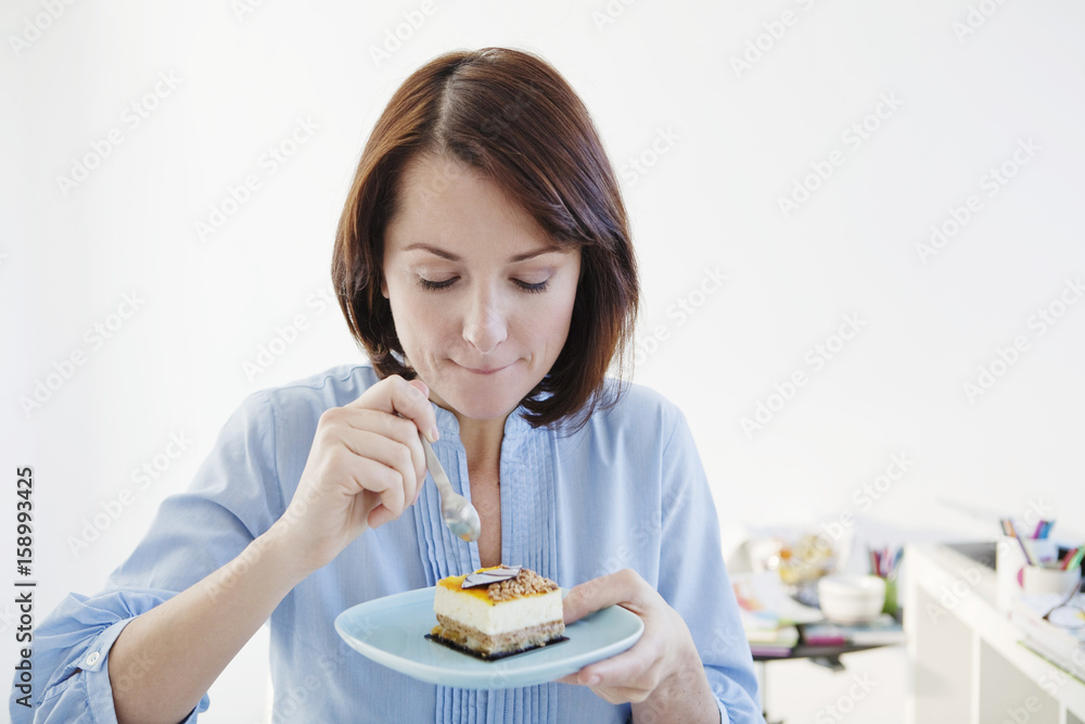 Woman eating sweets
