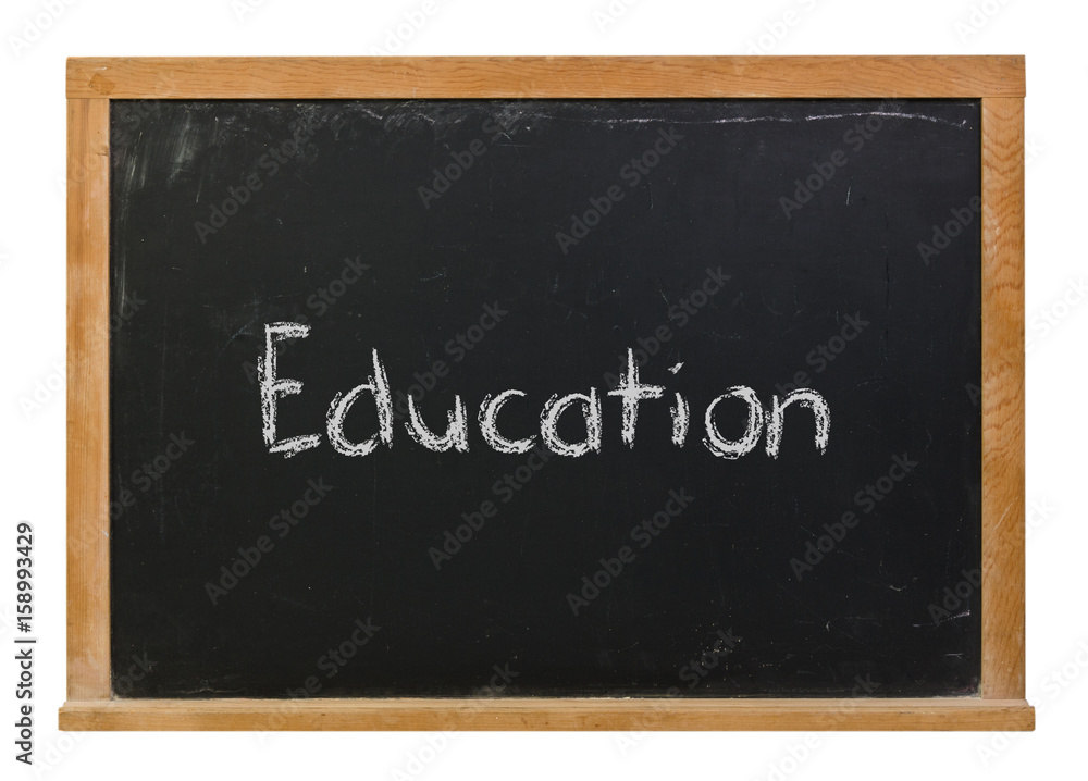 Education written in white chalk on a black chalkboard isolated on white Education written in white chalk on a black chalkboard isolated on white
