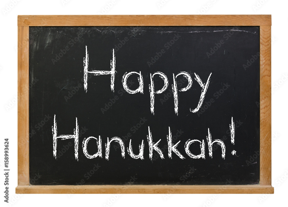 Obraz premium Happy Hanukkah written in white chalk on a black chalkboard isolated on white