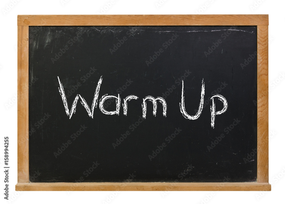 Warm up written in white chalk on a black chalkboard isolated on white Warm up written in white chalk on a black chalkboard isolated on white