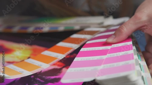 Wallpaper Mural Color model Pantone, PMS (Pantone Matching System). . Selection of colors for the Panton system. Shades of pink on Panton's fan: the artist compares the color of the picture and the pantone Torontodigital.ca