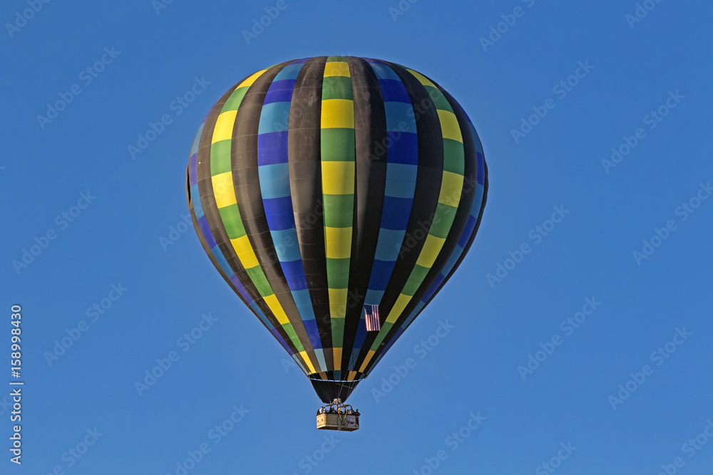 Naklejka premium Hot air balloon flight above California winery vineyard