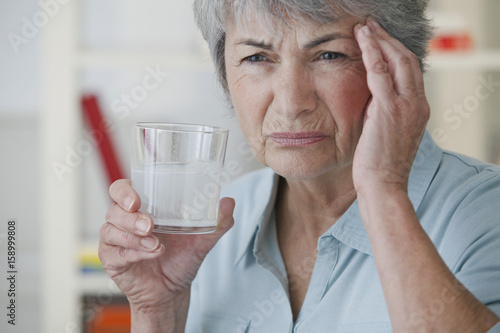 Slika na platnu Elderly person taking medication