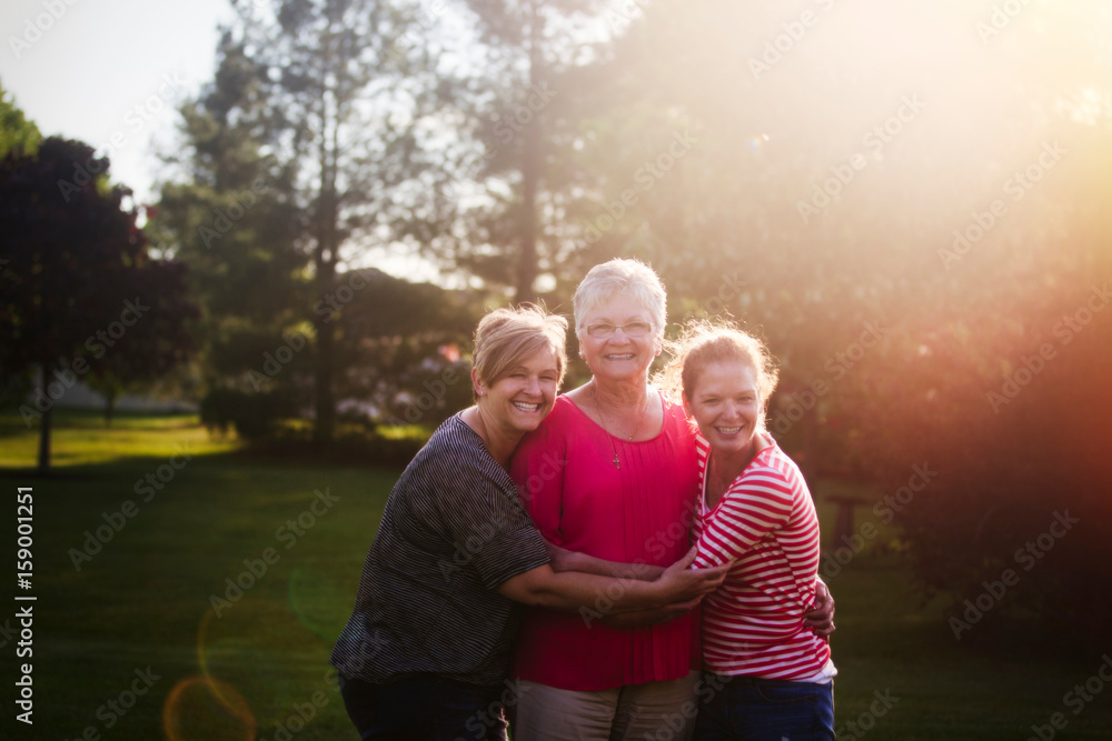 Portrait of mother and adult daughters Portrait of mother and adult daughters