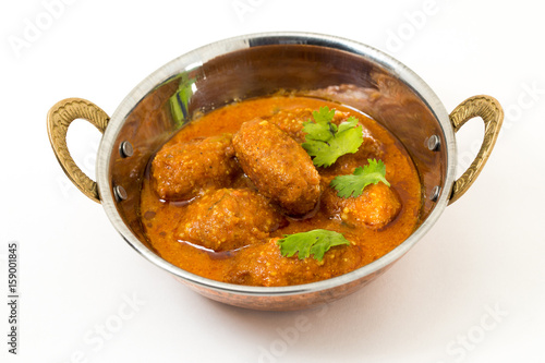 Malai Kofta or meatballs - Traditional Indian food  served in a brass utensil