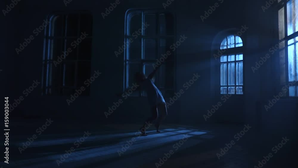 Teenager dancer girl in white dress dancing contemporary. Lunar silhouette Teenager dancer girl in white dress dancing contemporary. Lunar silhouette