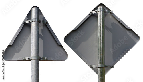 Two metal road signs - triangular and diamond-shaped - a reverse side. photo