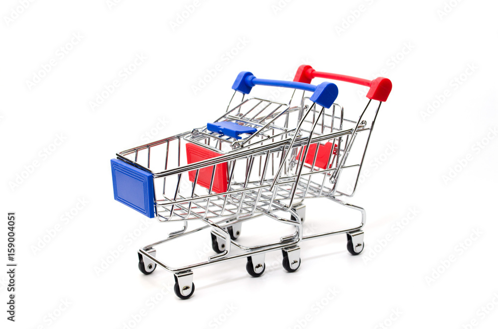 mini supermarket shopping cart blue and red color on white background, holiday sale and shopping concept, selective focus, copy space