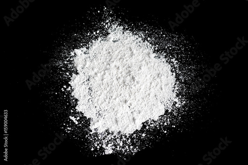 White powder on the black background