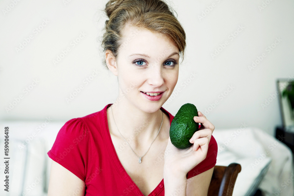 Woman eating raw vegetables Woman eating raw vegetables