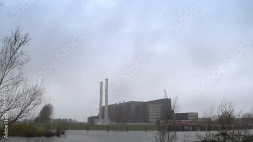 Demolition of factory chimneys photo