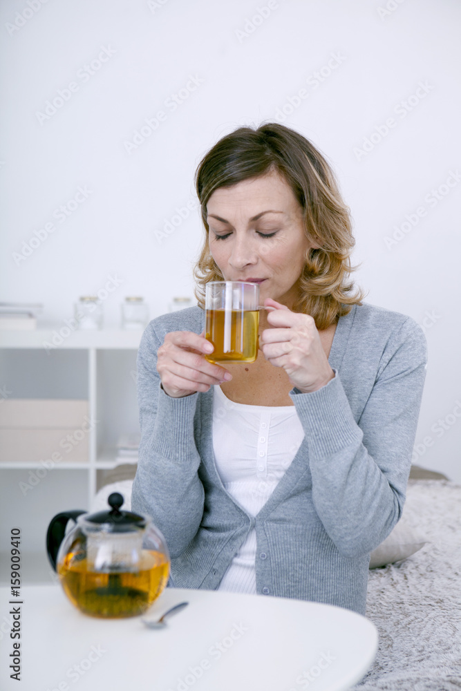 Woman drinking herbal tea Woman drinking herbal tea