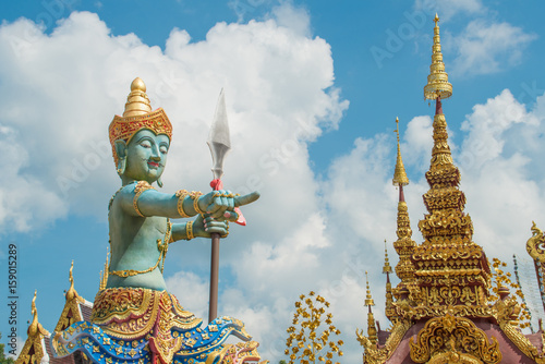 The guardian statue in Wat Sangkaew Phothiyan the beautiful modern style temple in Chiang Rai province of Thailand. photo