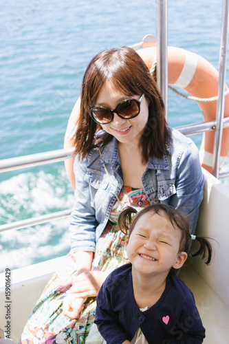 Mother and daughter on a boat photo