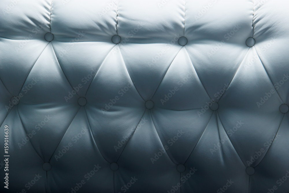 Fototapeta premium white and dark leather Texture Sofa backrest. Modern bedroom furniture.