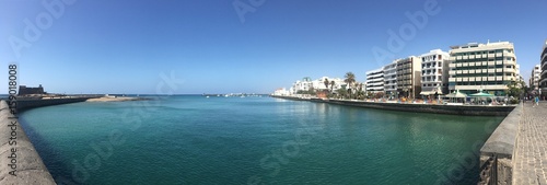 Panoramic view of the clear aqua blue waters  of the Arrecife Harbor in Lanzarote  Canary Islands  Spain  