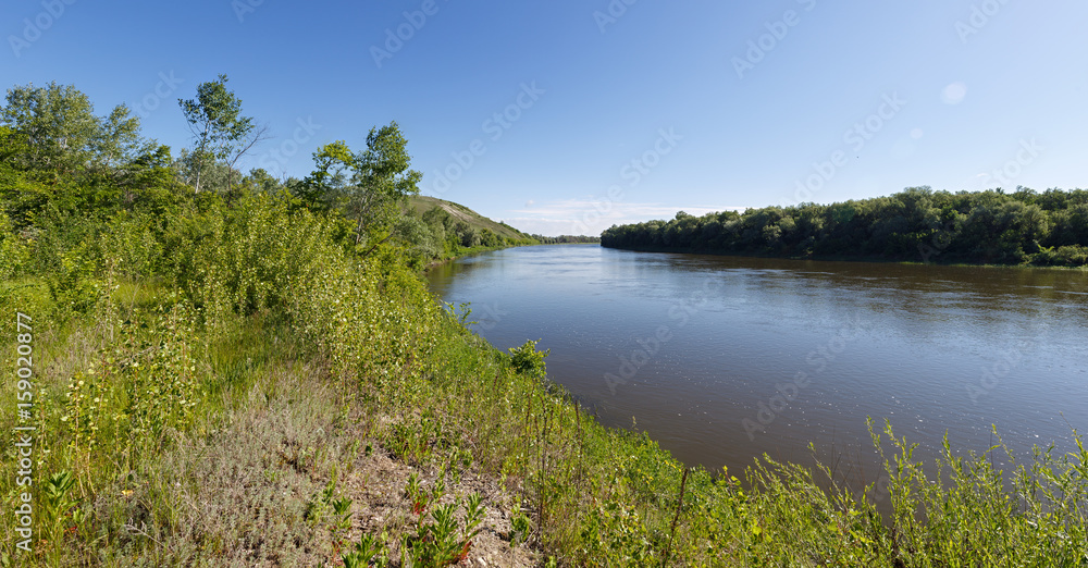 Panoramic view from the hills to the valley of the Don river. Landscape of the central part of Russia.