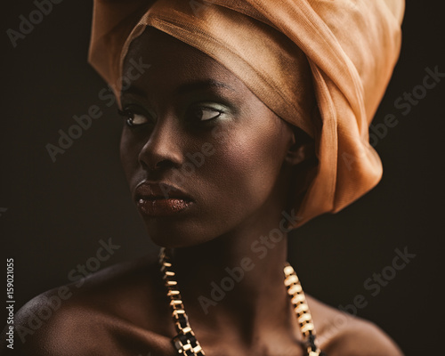 African Woman With an Orange Turban