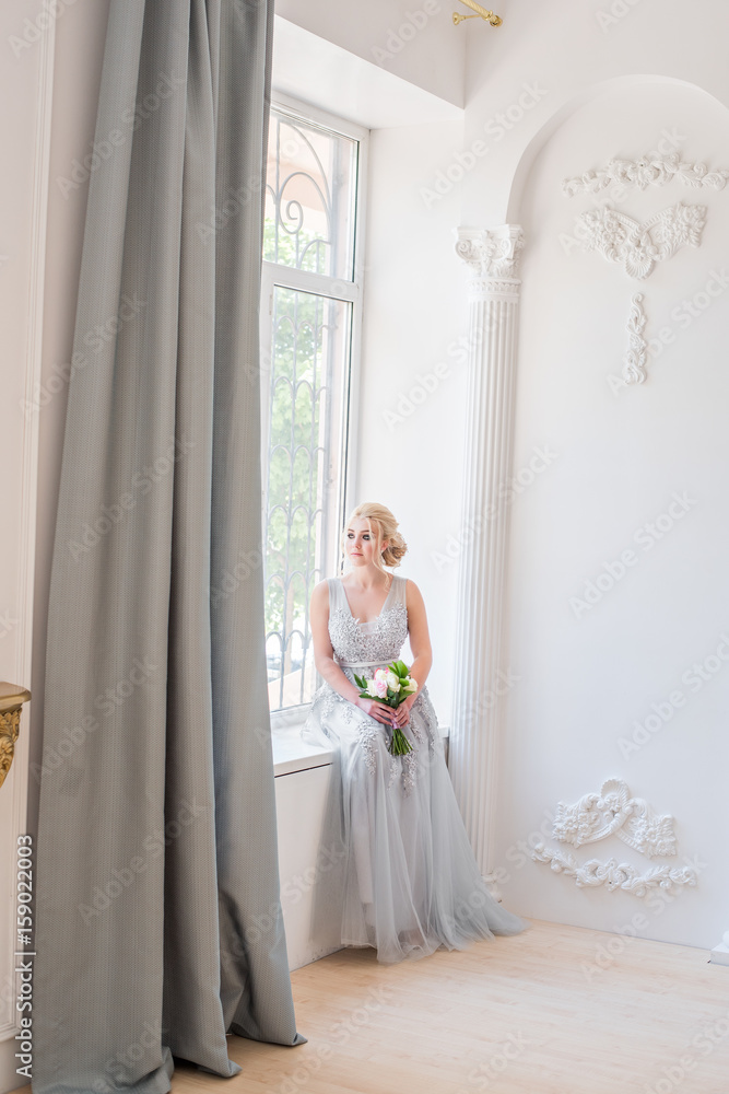 Fototapeta premium Fashion bride in gray dress with make-up smoky eyes
