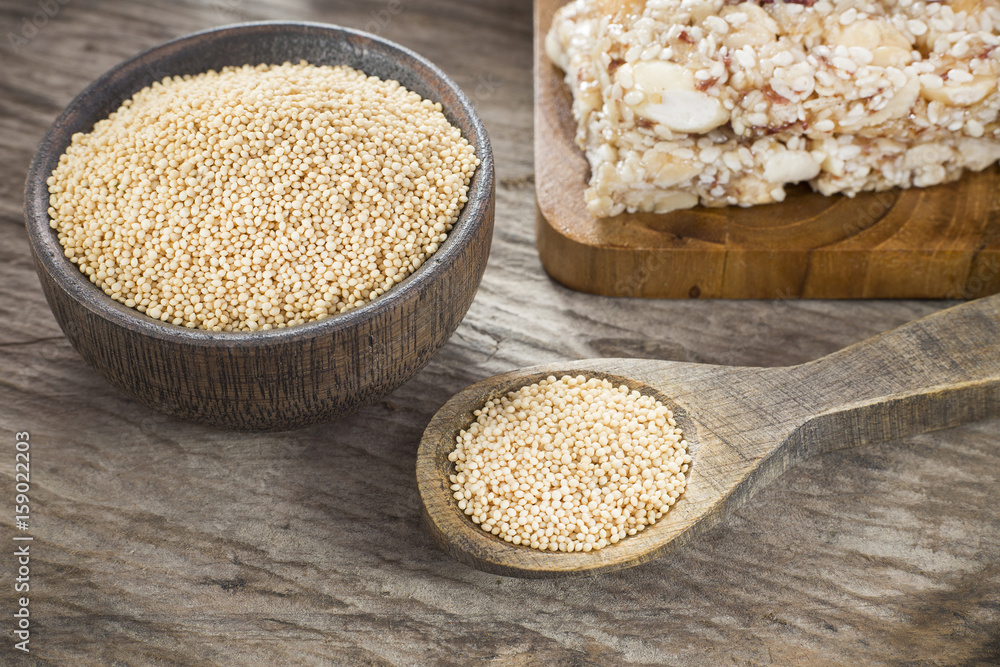 Amaranth bars in the wooden background - Amaranthus Amaranth bars in the wooden background - Amaranthus