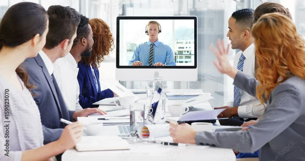 Business people having a conference call in meeting Business people having a conference call in meeting