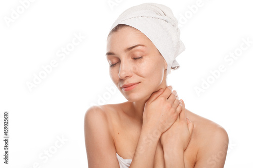 Sensual woman wrapped in towel