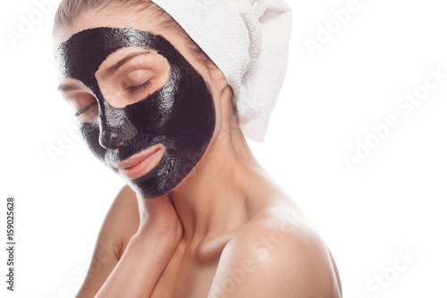 Woman pampering face skin