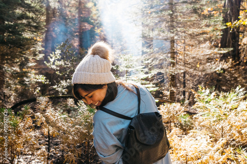 Wallpaper Mural female looking behind her in woods forest Torontodigital.ca