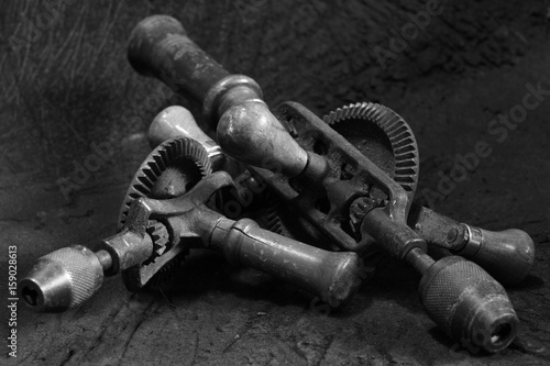Canvastavla Antique old-style manual hand drill in black and white image