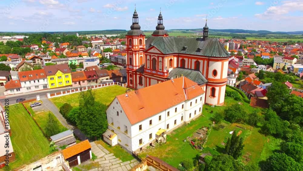 Church of The Assumption (1775) in small town Prestice. Architecture from above. Rare baroque monument in Czech Republic, Central Europe. Church of The Assumption (1775) in small town Prestice. Architecture from above. Rare baroque monument in Czech Republic, Central Europe.