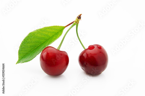 Ripe  juicy and appetizing cherry berries isolated on white background