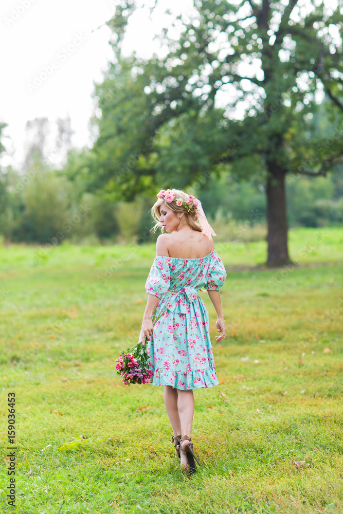 Portrait of a young beautiful woman on the nature Portrait of a young beautiful woman on the nature