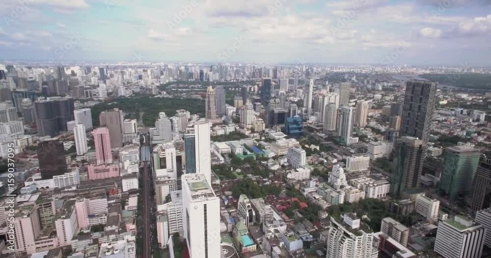 High Aerial Shot Over Bangkok City Center on a Clear Day, Ascending Pan Footage
High Aerial Shot Over Bangkok City Center on a Clear Day, Ascending Pan Footage