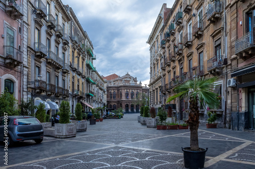 Street of Catania with the famous Opera Theatre Teatro Bellini on background - Catania, Sicily, Italy