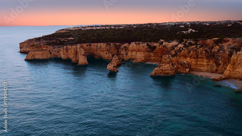 Aerial from famous beach Praia da Marinha in the Algarve Portugal at sunset