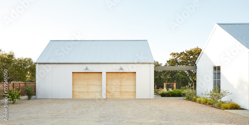 Architecture image of modern design farmhouse and garage  photo