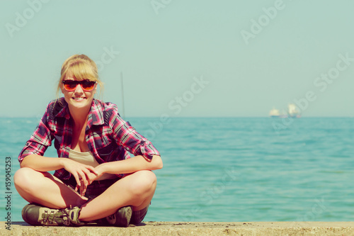 woman hiker relaxing on sea coast © anetlanda