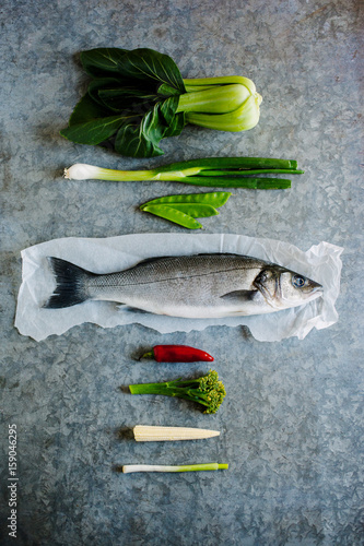 Line caught sea bass and ingredients for cooking it with
