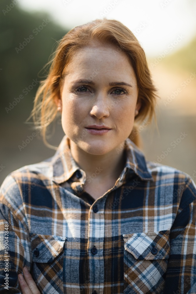 Portrait of beautiful young woman at farm Portrait of beautiful young woman at farm