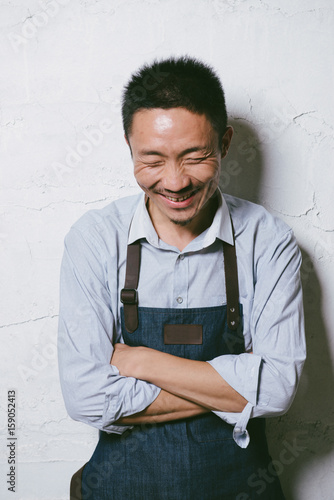 Portrait of young coffee maker photo